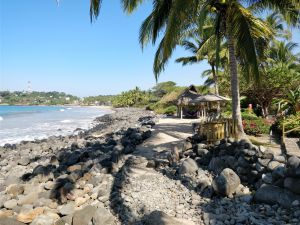 There is a fancy resort that hosts retreats at the south end of the beach. A bit beyond our paygrade but it was interesting to walk through and dream about relaxing in their pool.