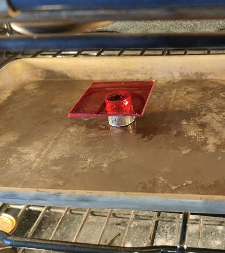 3. With the 2.5" x 2.5" square piece of acrylic resting on the socket, it was baked at 350 degrees for 15 minutes