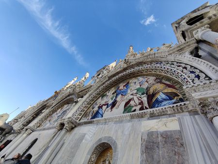 Looking up from the balcony at the outdoor mosaics
