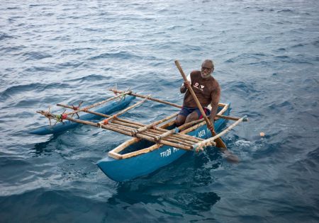 Nicholas stopped by to trade fruit for some t-shirts