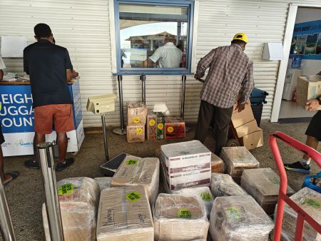 Stacked and added to the other cargo for delivery