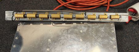 1-1/4" Flat bar with QTY 9 - 25W 330 ohm resistors (3 resistors in series, with three sets) - this greatly improved the heat dispersion)