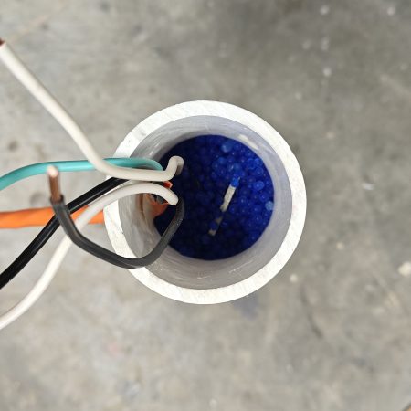 Silica beads fill the recharge tube while the resistor heater is kept centered in the tube