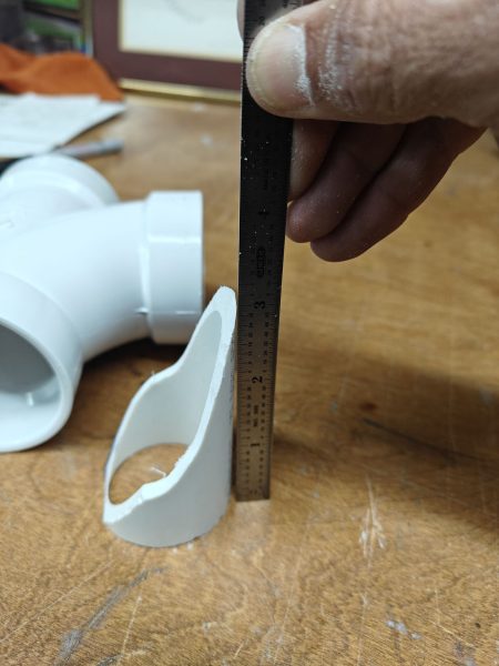 A baffle was fabricated to direct the moist air away from the humidity sensors