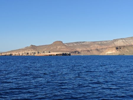 One sailboat in a nearby anchorage