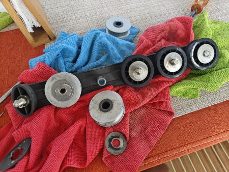 Disassembled deck organizer, showing the washer removed on the frozen sheeve