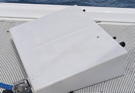 It ended up being easier to remove the starboard tank and clean it on the deck