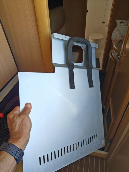 Step 3 - with the fan removed, the aluminum cover can be removed